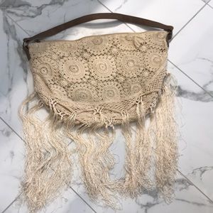 Large, fringe half moon bag